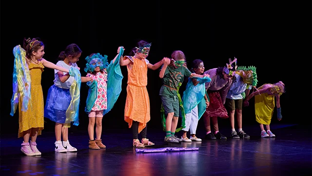 Summer-Camp-Kids-Dancing-On-Stage